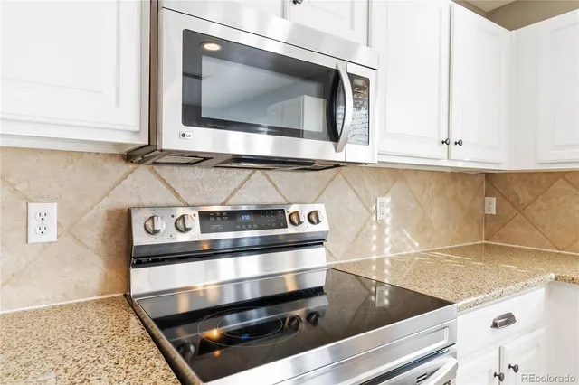 a view of stove and microwave