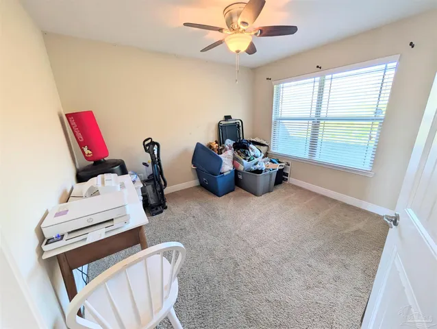 a room with furniture and a window