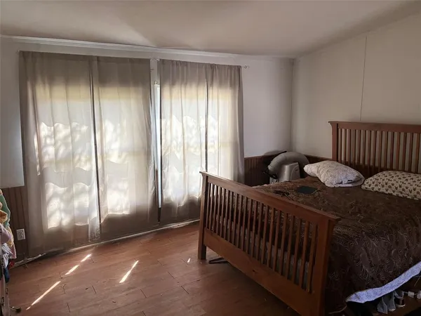 a view of a room with windows