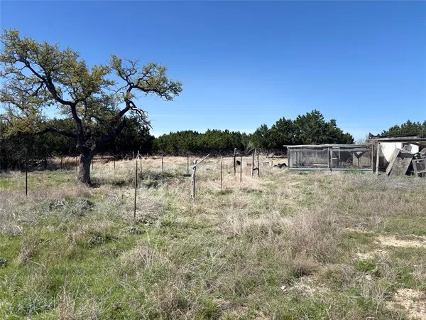 a view of house with outdoor space