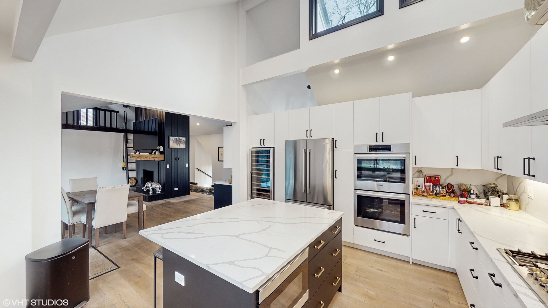 15160 West Oak Spring Road Libertyville, IL 60048 - Photo 12 of 36 a kitchen with stainless steel appliances a stove refrigerator sink and cabinets