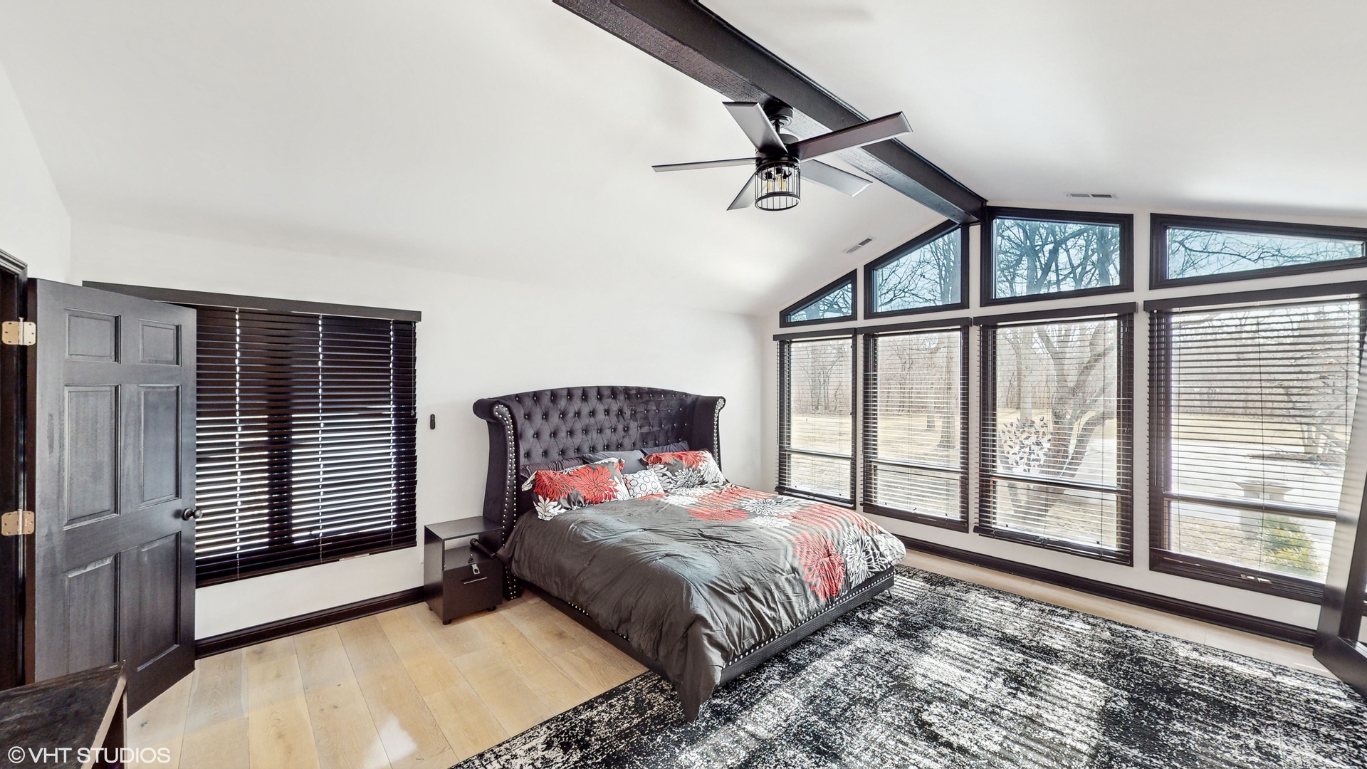 15160 West Oak Spring Road Libertyville, IL 60048 - Photo 14 of 36 a bedroom with a large bed and a large window