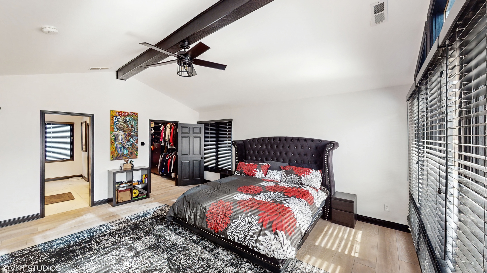 15160 West Oak Spring Road Libertyville, IL 60048 - Photo 16 of 36 a bedroom with a bed and wooden floor