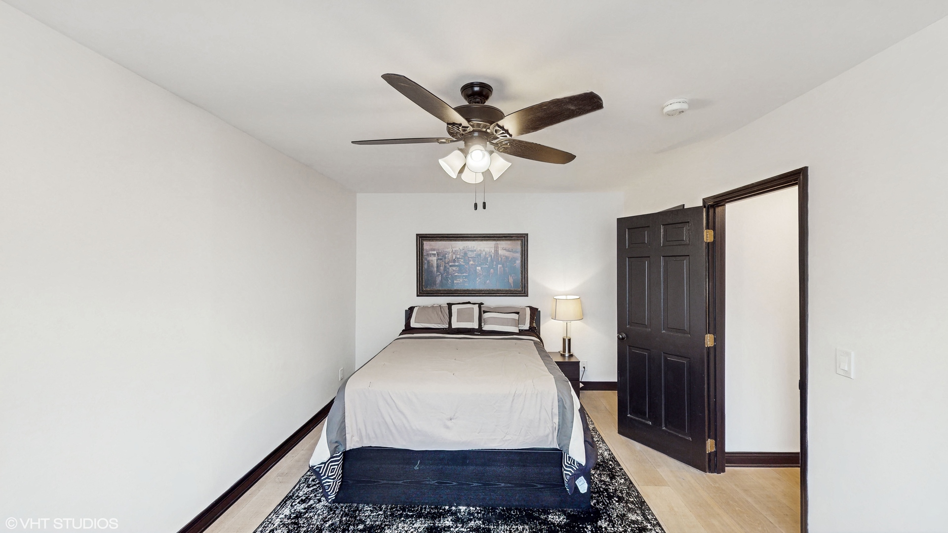 15160 West Oak Spring Road Libertyville, IL 60048 - Photo 19 of 36 a bedroom with bed and a window