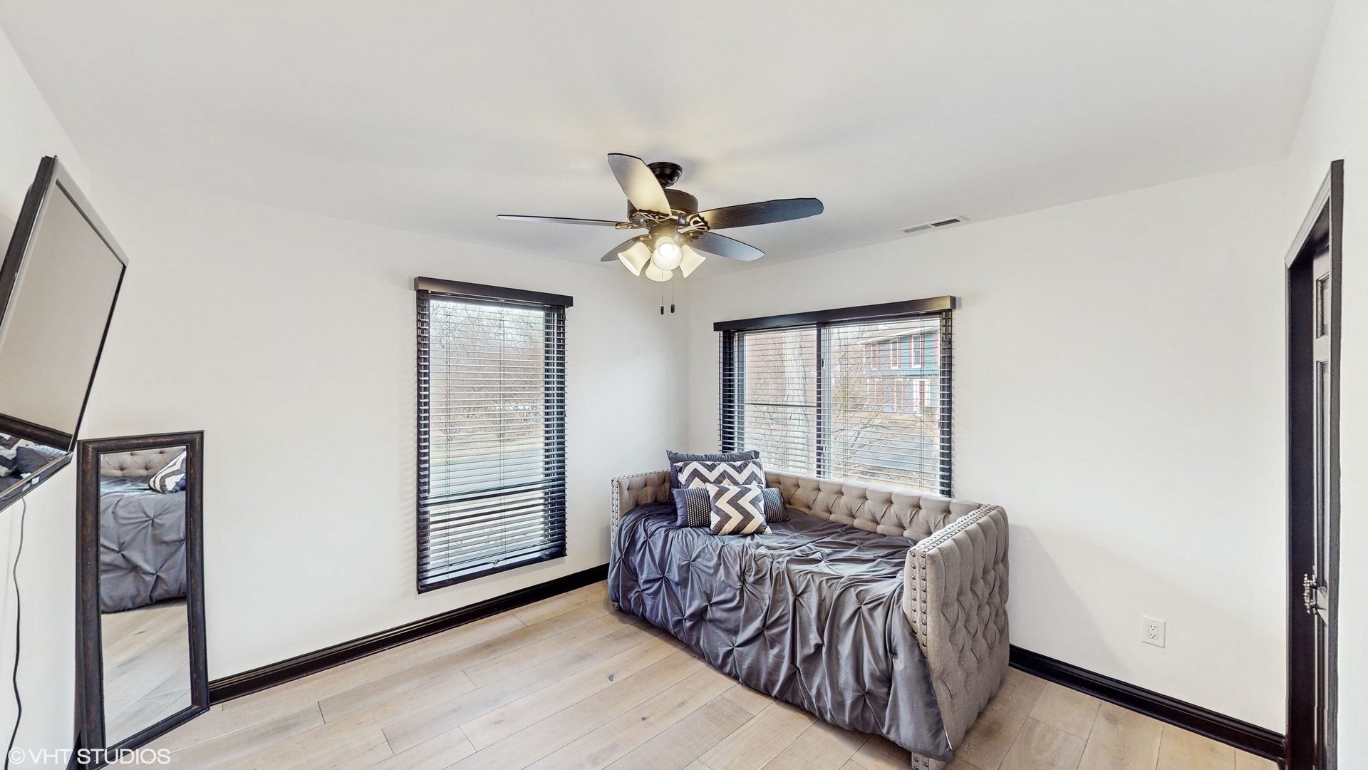 15160 West Oak Spring Road Libertyville, IL 60048 - Photo 22 of 36 a bedroom with furniture and windows