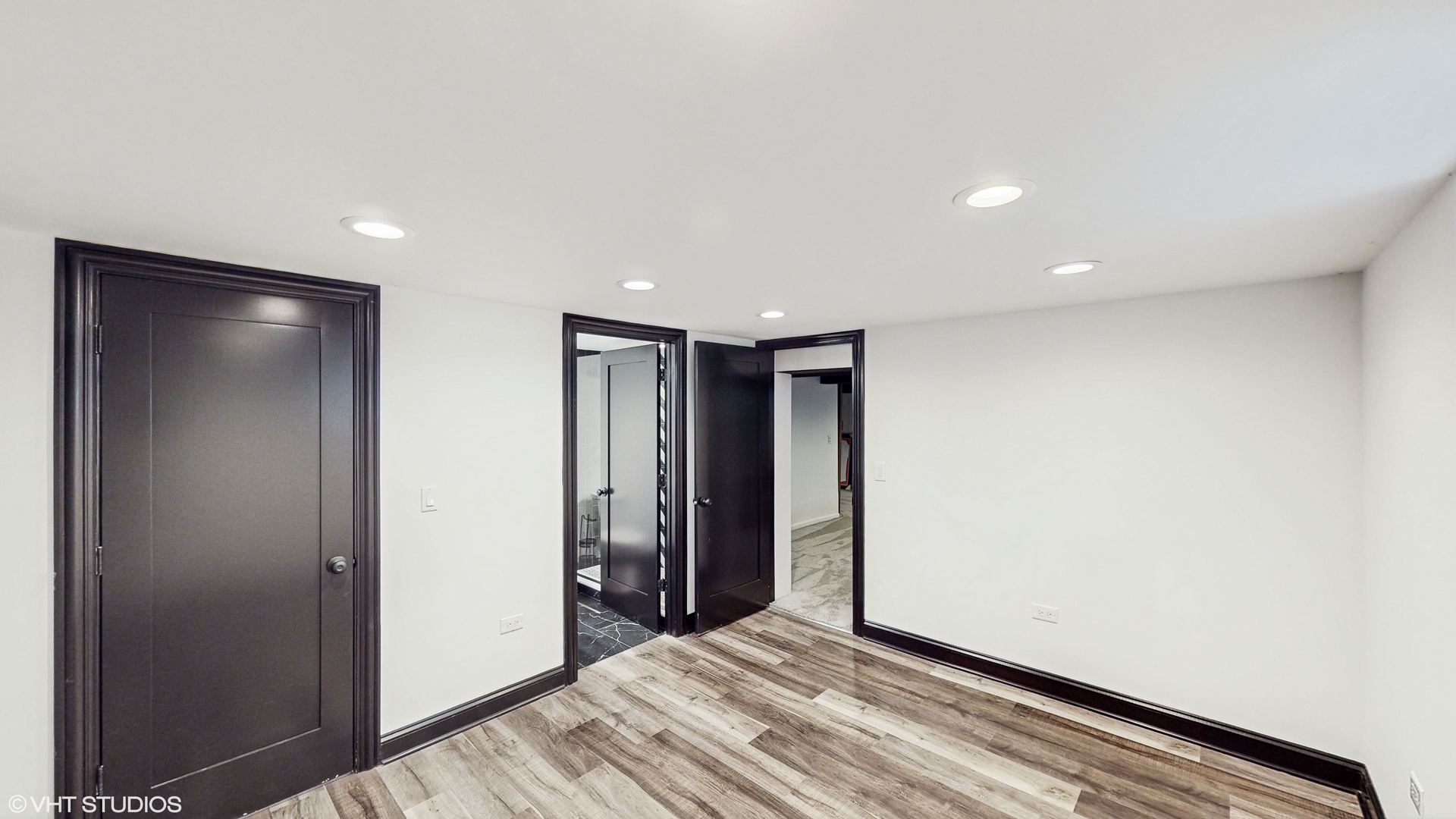15160 West Oak Spring Road Libertyville, IL 60048 - Photo 29 of 36 a view of hallway with stairs and wooden floor
