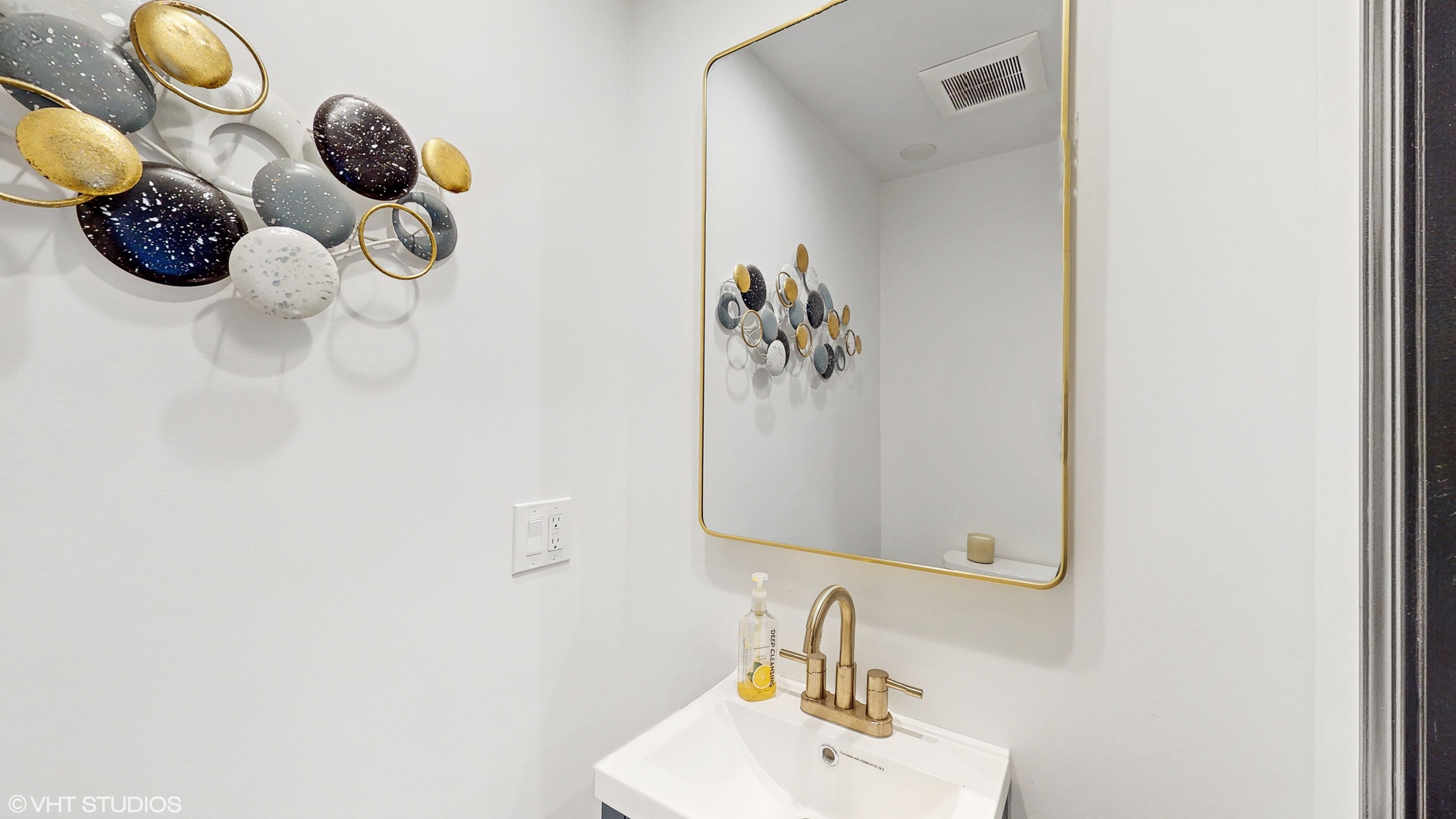 15160 West Oak Spring Road Libertyville, IL 60048 - Photo 31 of 36 a bathroom with a sink mirror and vanity