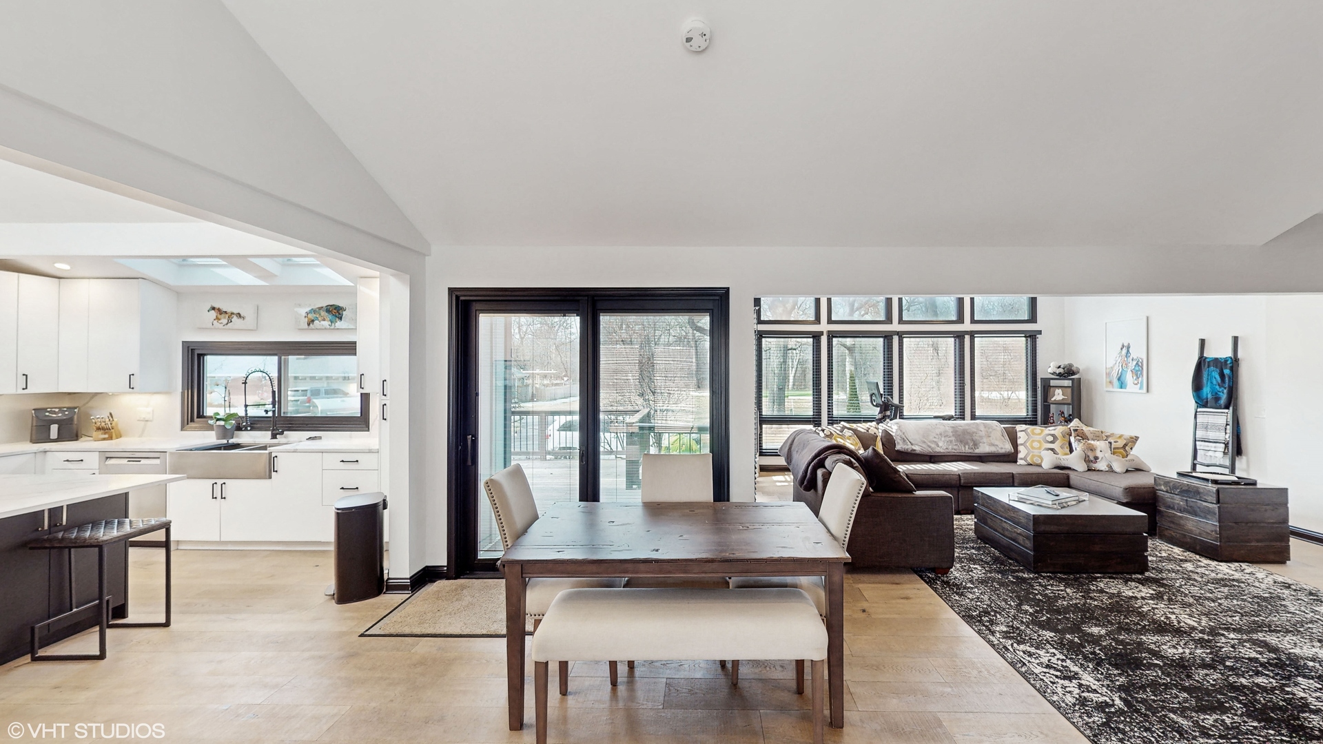 15160 West Oak Spring Road Libertyville, IL 60048 - Photo 8 of 36 a living room with furniture large windows and wooden floor