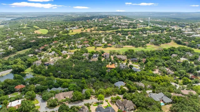 a view of a city with mountains in the background