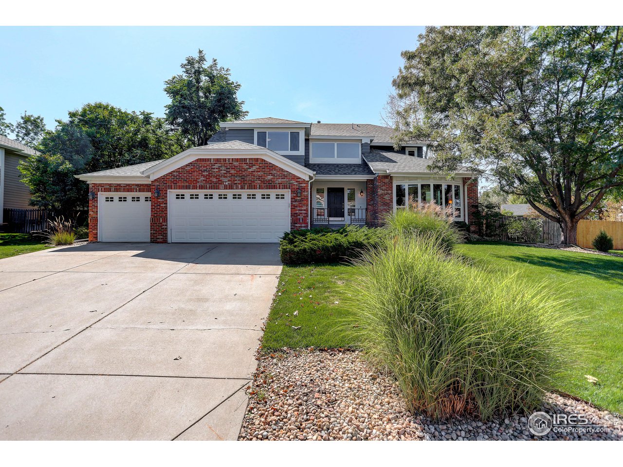 7346 Augusta Drive Boulder, CO 80301 - Photo 1 of 40 a front view of a house with garden