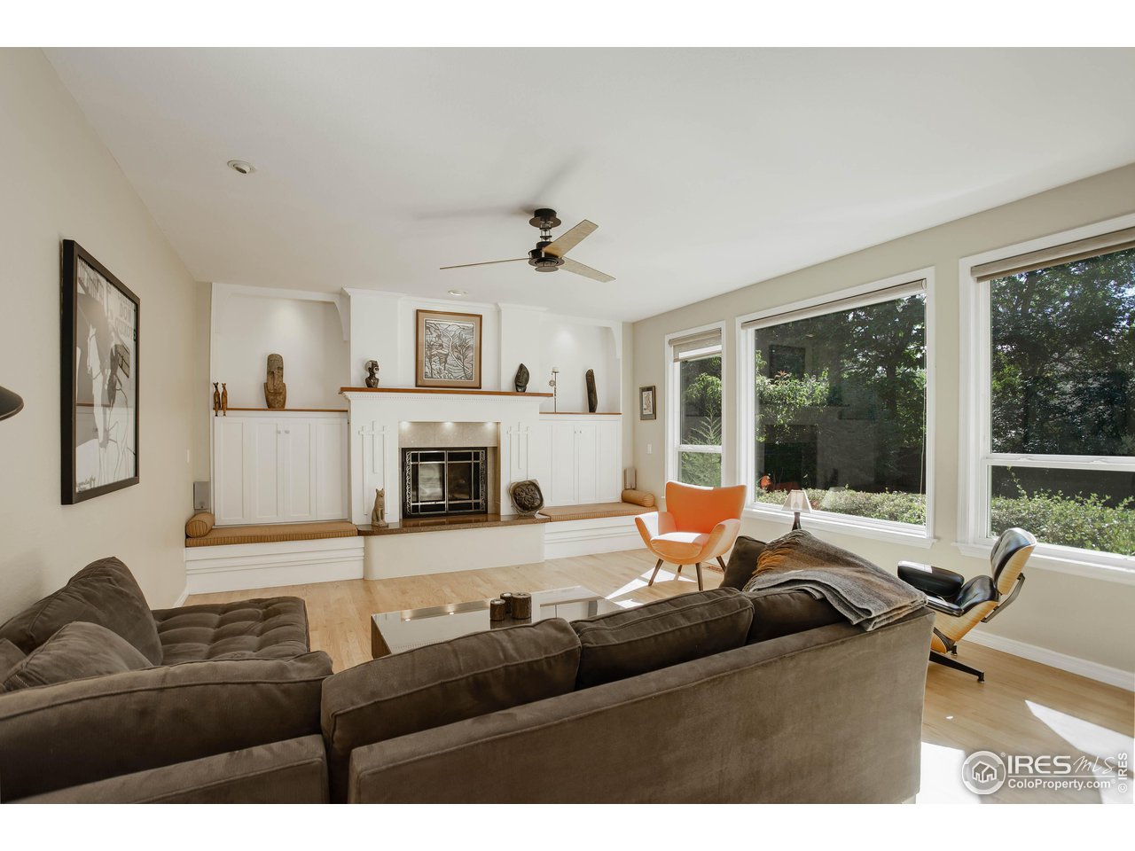 7346 Augusta Drive Boulder, CO 80301 - Photo 16 of 40 a living room with furniture and a fireplace