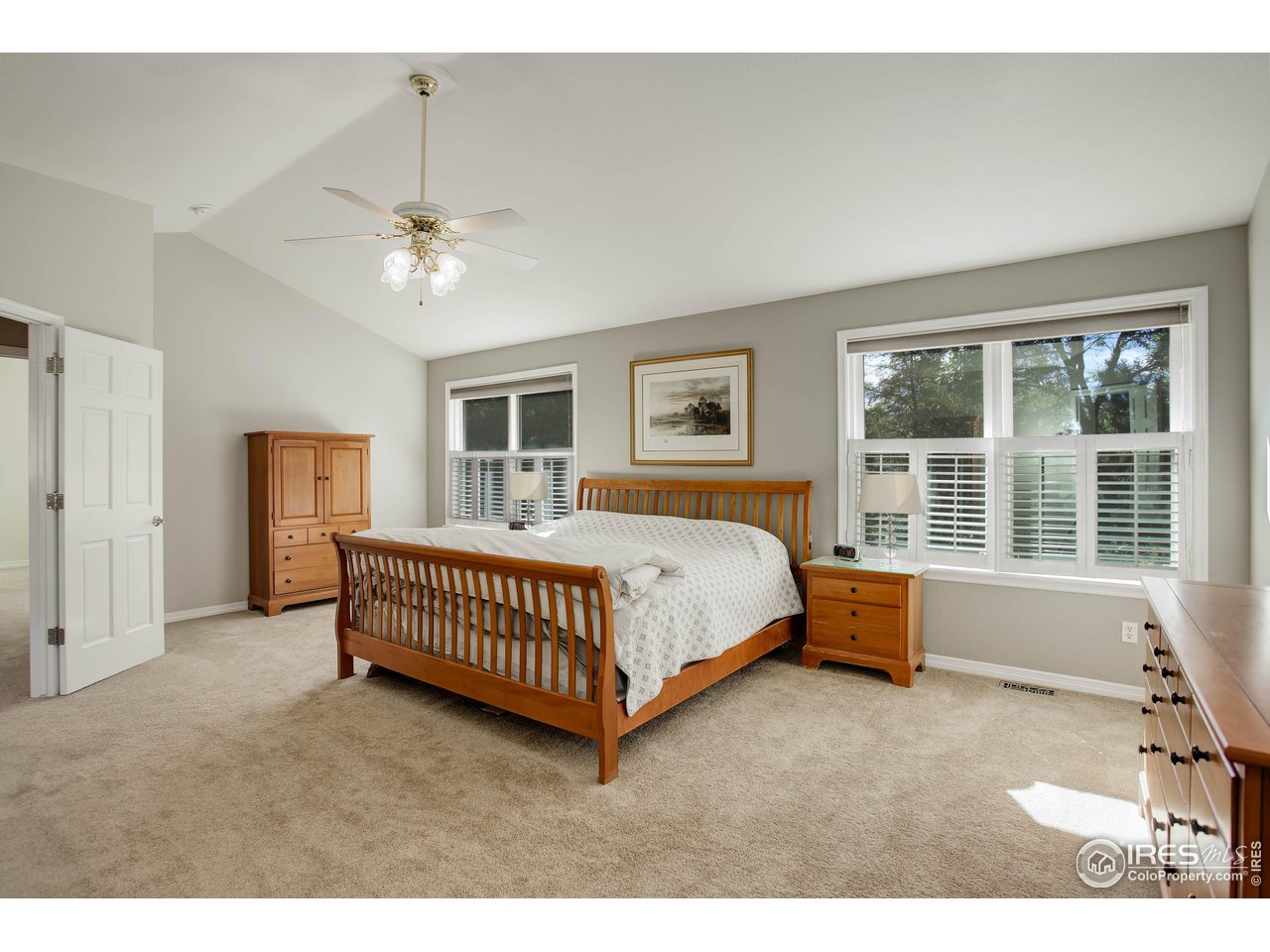 7346 Augusta Drive Boulder, CO 80301 - Photo 19 of 40 a bed room with a bed and a window
