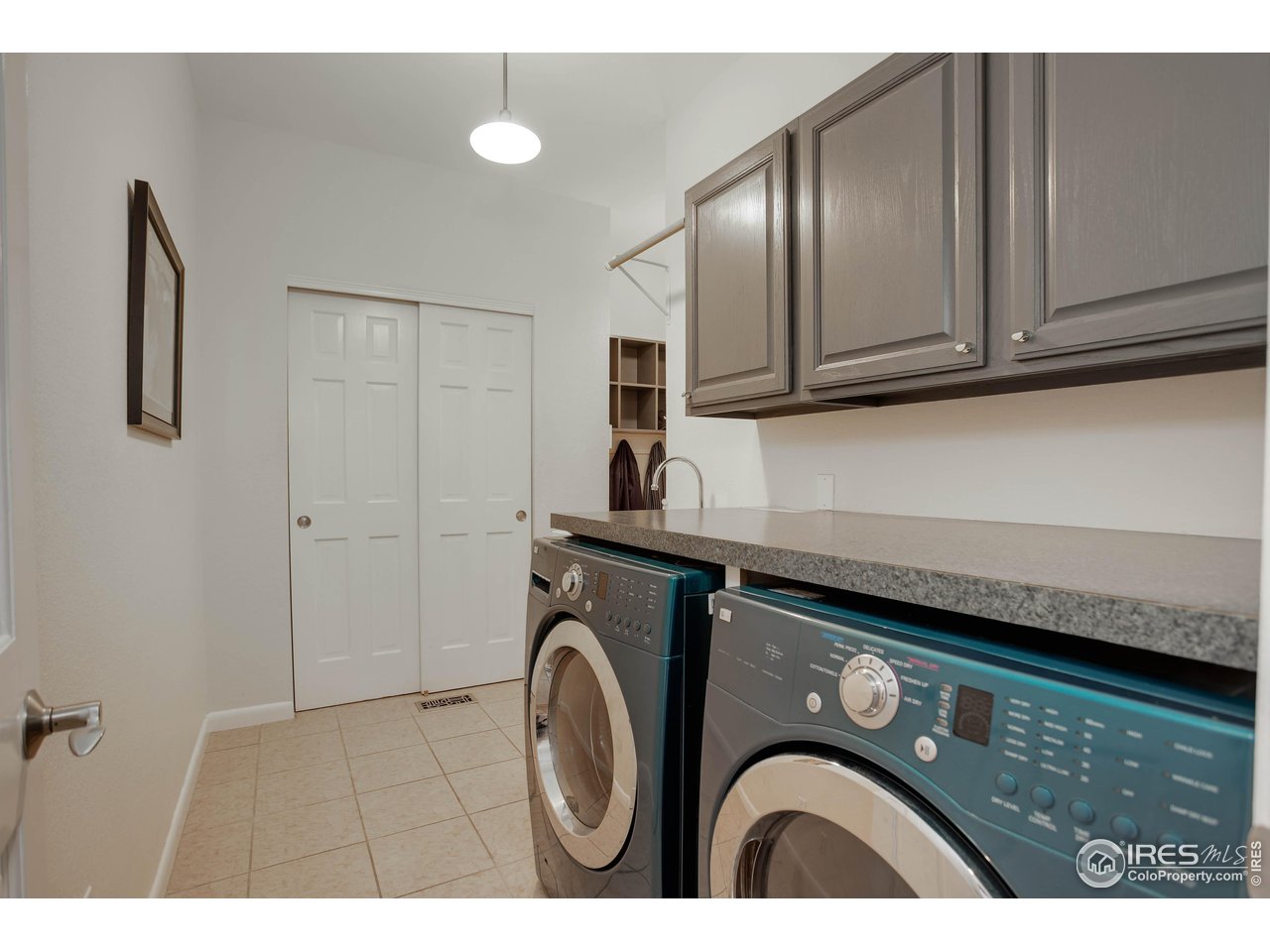 7346 Augusta Drive Boulder, CO 80301 - Photo 32 of 40 a utility room with dryer and washer