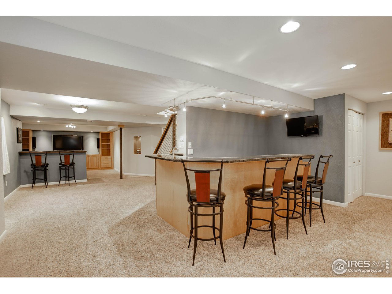 7346 Augusta Drive Boulder, CO 80301 - Photo 34 of 40 a dining room with furniture and a floor to ceiling window