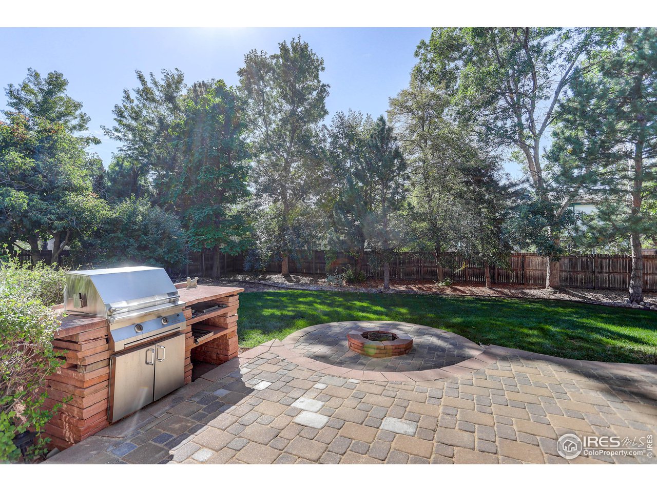 7346 Augusta Drive Boulder, CO 80301 - Photo 7 of 40 a view of a backyard with sitting area