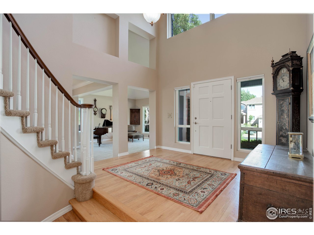 7346 Augusta Drive Boulder, CO 80301 - Photo 8 of 40 a view of an entryway and livingroom with furniture