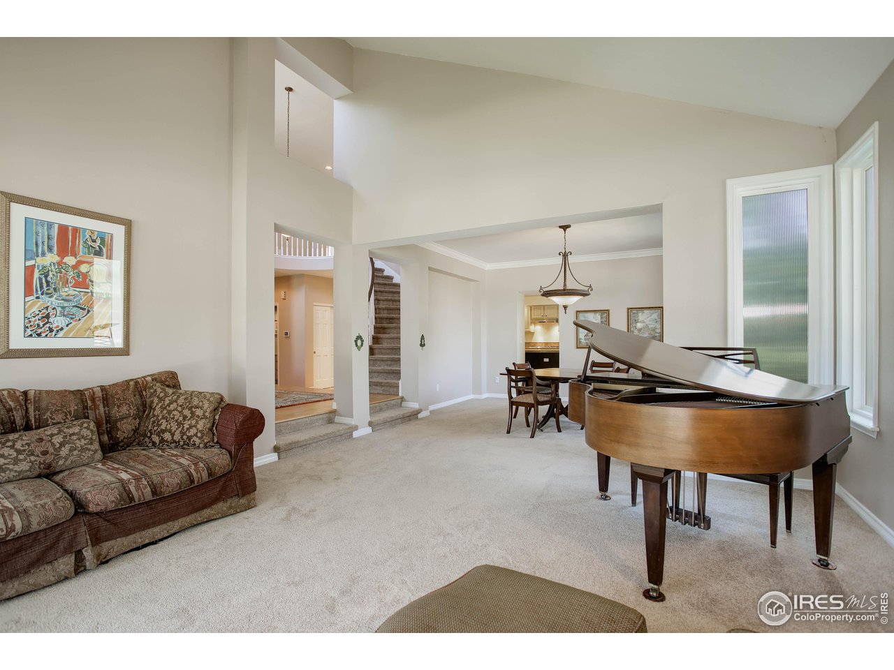7346 Augusta Drive Boulder, CO 80301 - Photo 10 of 40 a living room with furniture and a table