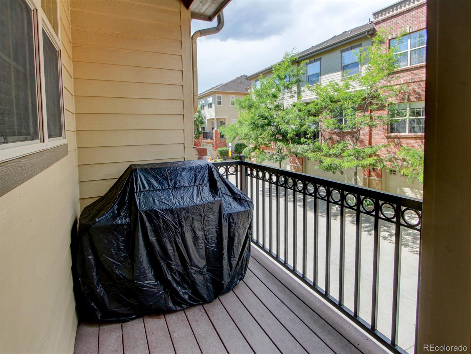 10186 RidgeGate Circle Lone Tree, CO 80124 - Photo 23 of 24 a view of balcony with wooden floor