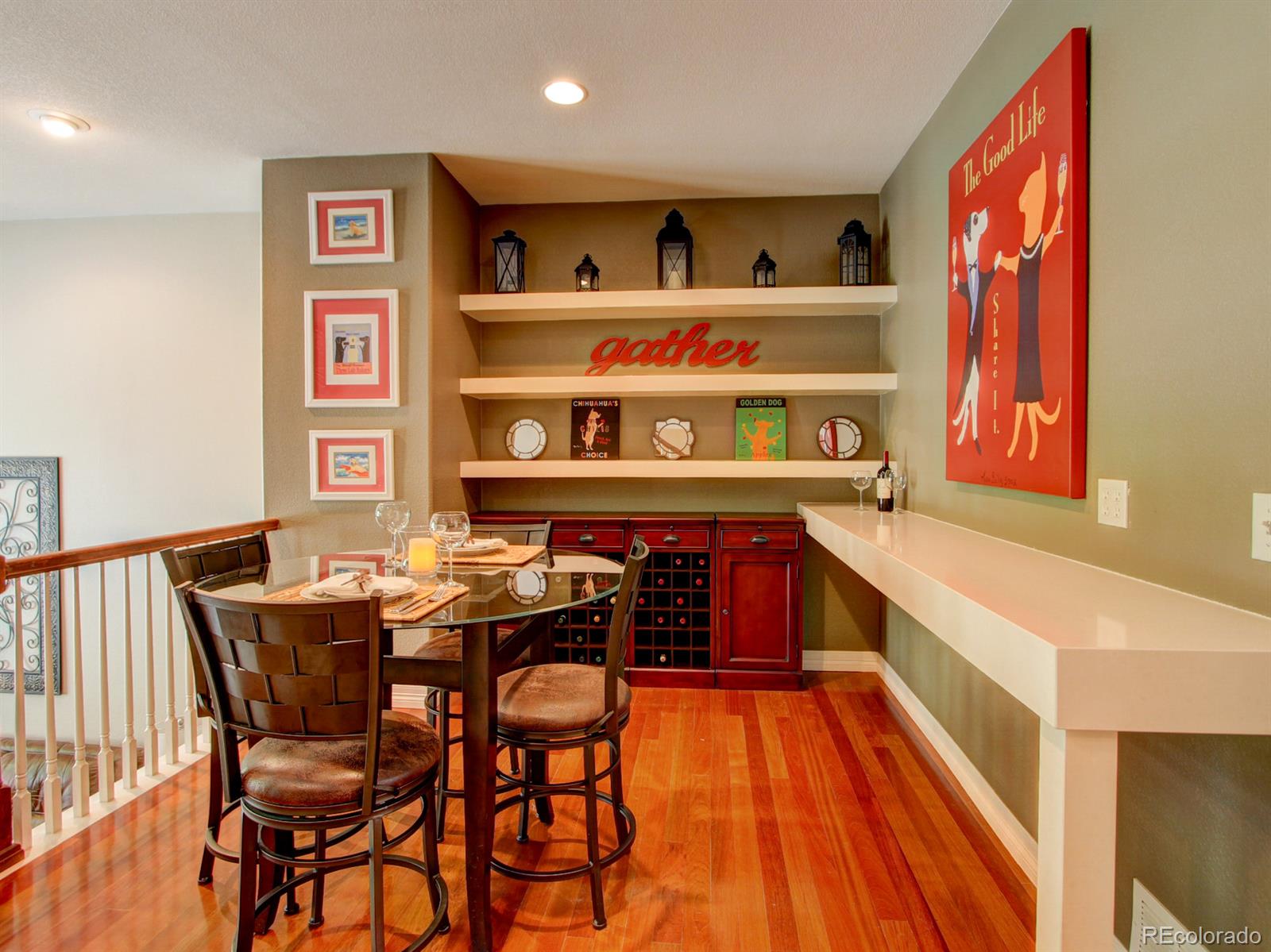 10186 RidgeGate Circle Lone Tree, CO 80124 - Photo 5 of 24 a view of a dining room with furniture window and wooden floor