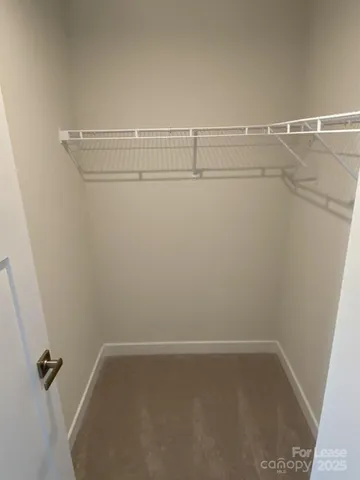 a bathroom with a sink double vanity and a window