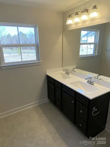 a bathroom with a shower and a toilet