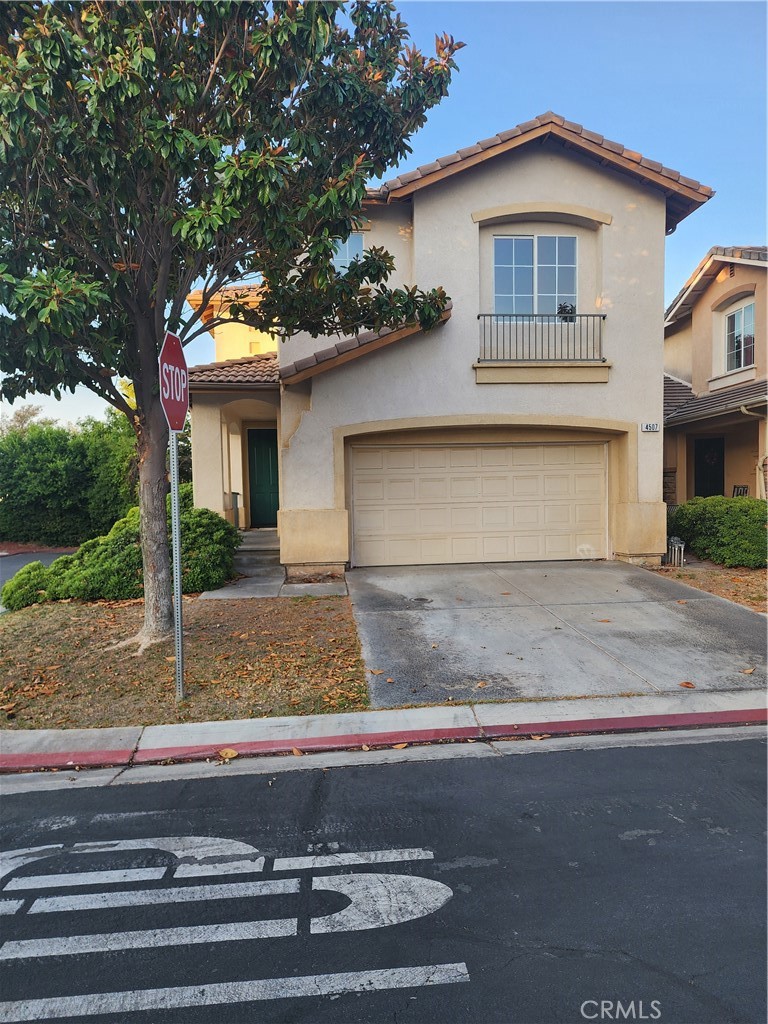 4507 Country Glen Court Riverside, CA 92505 - Photo 1 of 1 a front view of a house with garage