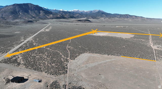 Undisclosed Address Junction, UT 84740 - Photo 7 of 9 Bird's eye view of a mountainous background and a desert landscape
