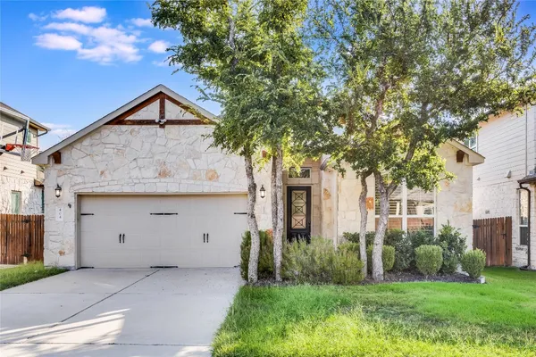a house view with a garden space