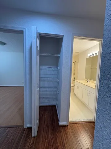 a bathroom with a double vanity sink mirror and double