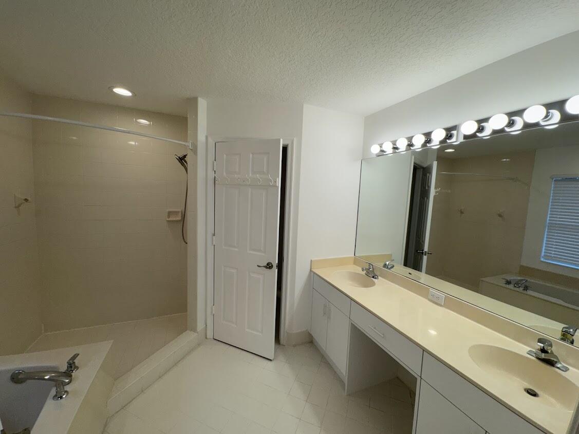 18237 Boca Way Drive Boca Raton, FL 33498 - Photo 25 of 36 a bathroom with a double vanity sink mirror and double