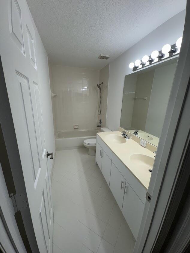 18237 Boca Way Drive Boca Raton, FL 33498 - Photo 27 of 36 a bathroom with a double vanity sink and mirror