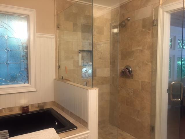 7798 Zebulon Road, Unit 1A Macon, GA 31220 - Photo 12 of 14 a bathroom with a bathtub and shower