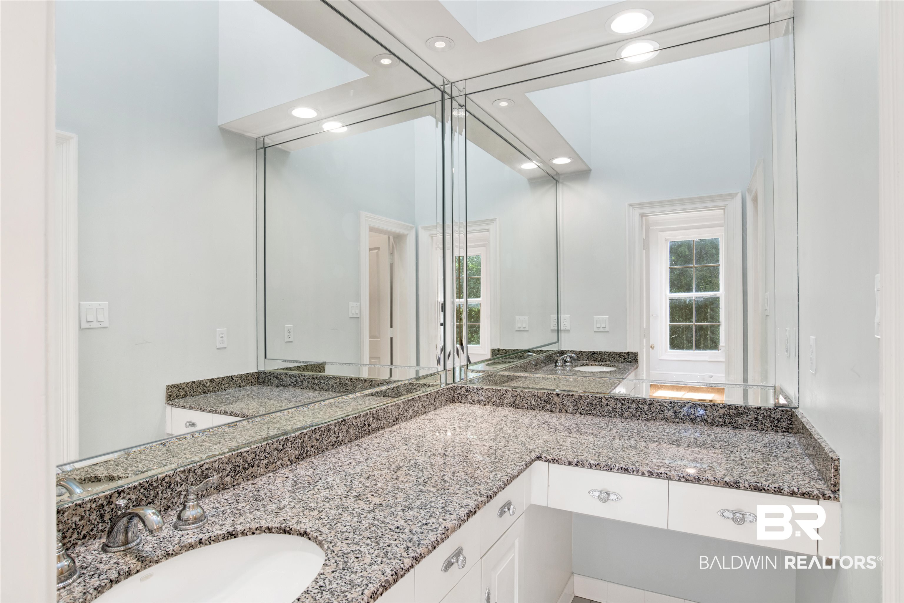 3816 Austill Lane Mobile, AL 36608 - Photo 40 of 80 Full bath featuring double vanity, recessed lighting, and a skylight