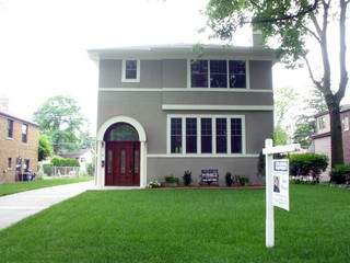 394 Bartram Road Riverside, IL 60546 - Photo 1 of 1 a front view of a house with garden