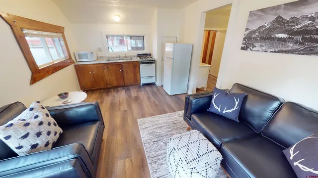 a living room with furniture and a couch