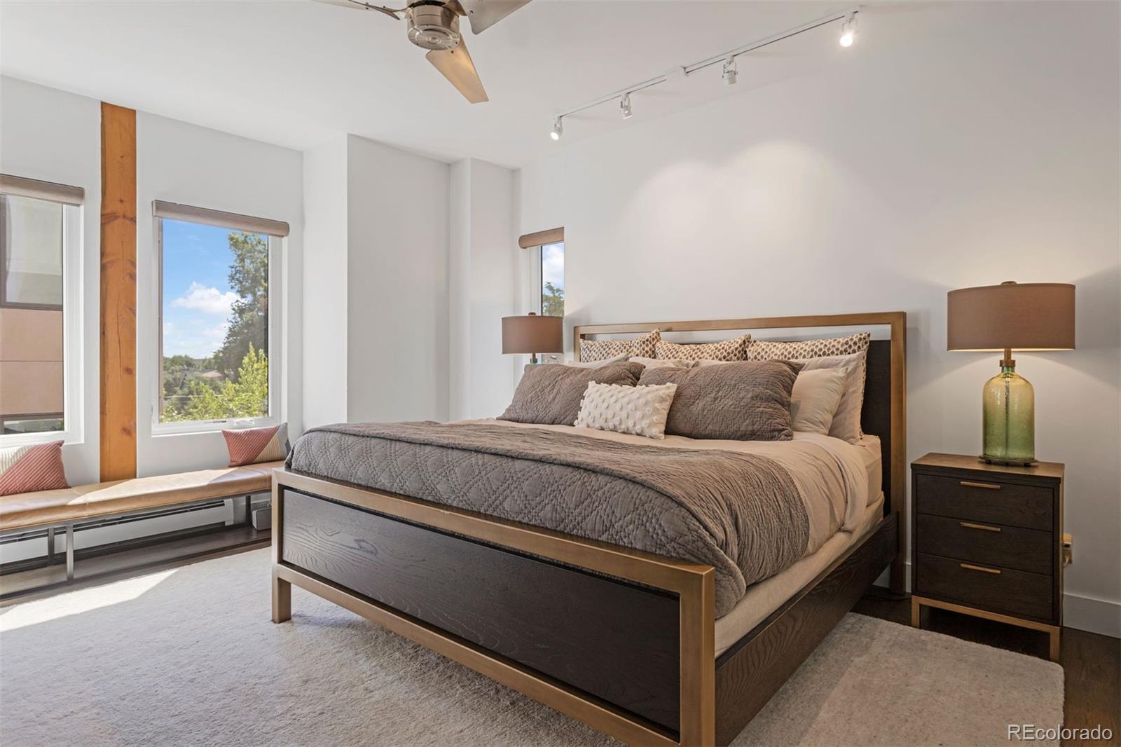 3400 Tejon Street Denver, CO 80211 - Photo 22 of 43 a spacious bedroom with a bed and a window