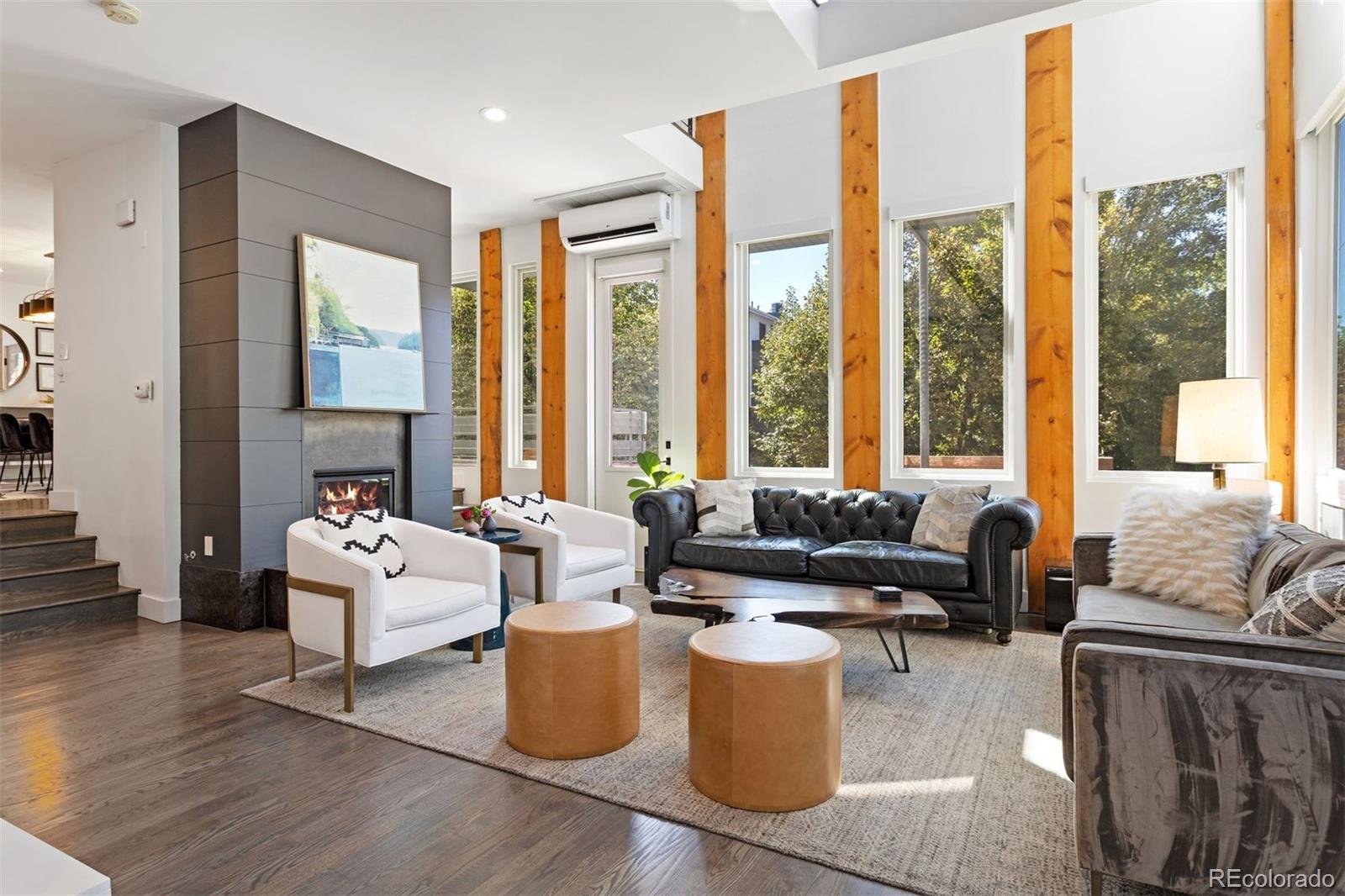 3400 Tejon Street Denver, CO 80211 - Photo 3 of 43 a living room with furniture and large windows