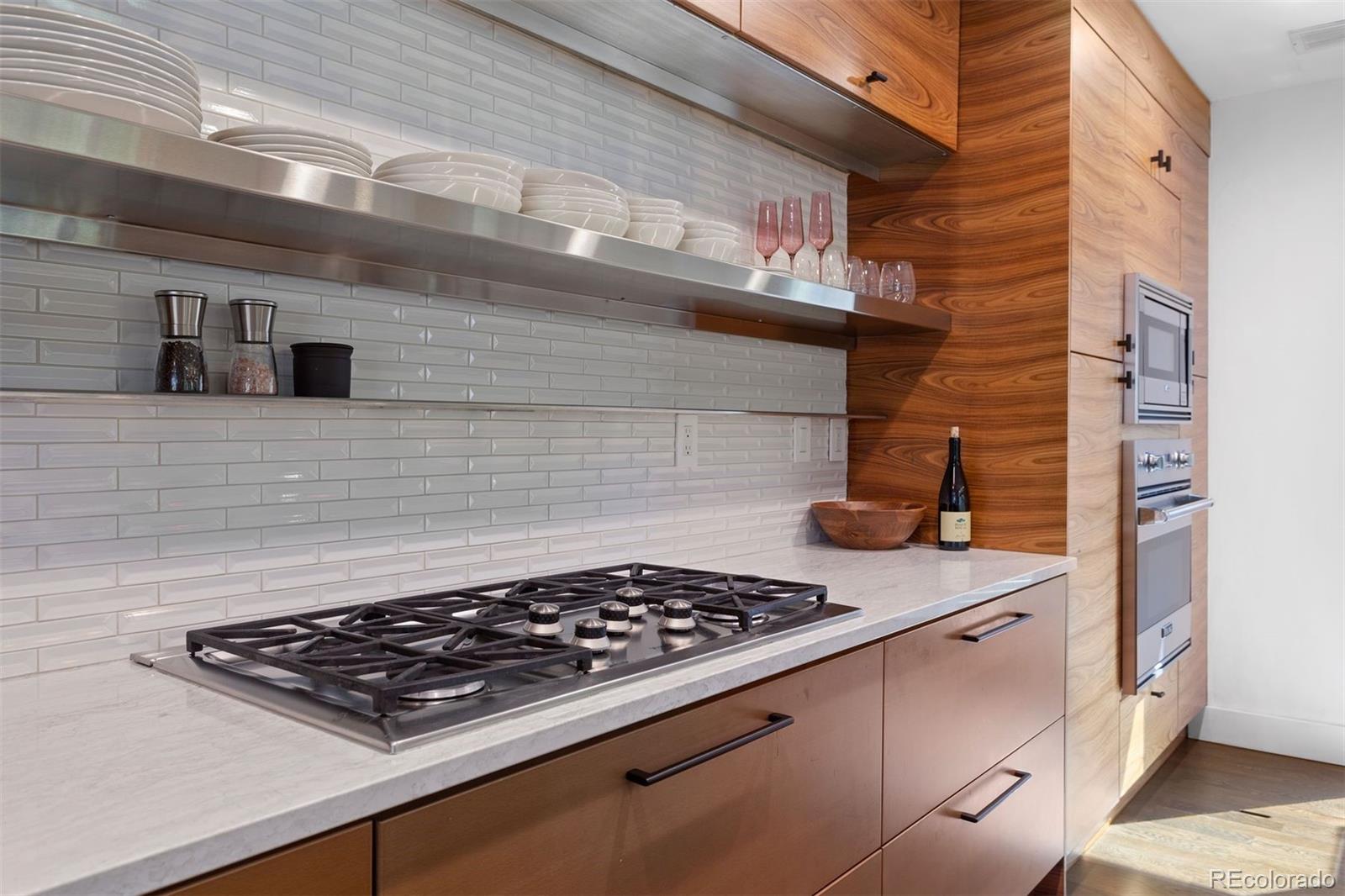 3400 Tejon Street Denver, CO 80211 - Photo 10 of 43 a stove top oven sitting inside of a kitchen