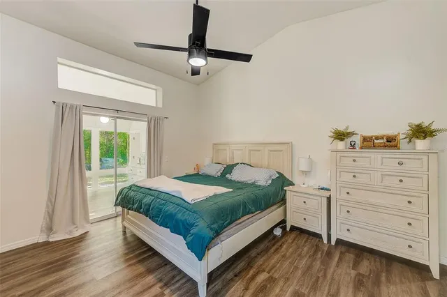 a spacious bathroom with a double vanity sink a mirror and a shower