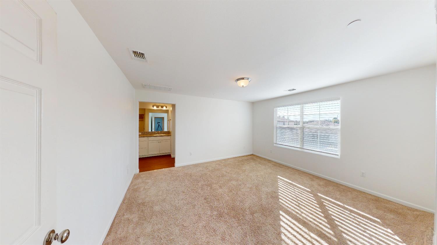 4826 North Casey Avenue Fresno, CA 93723 - Photo 32 of 36 a view of an empty room with a window