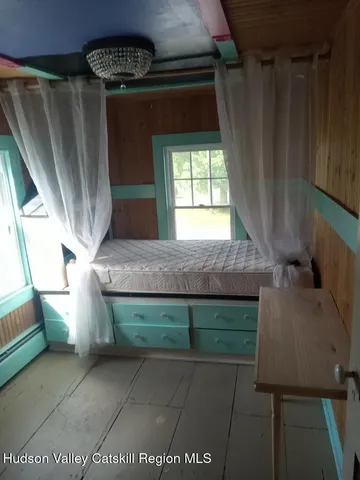 a bathroom with a sink a mirror and a toilet