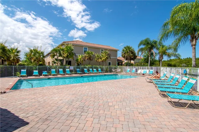 a view of park with swings and slides