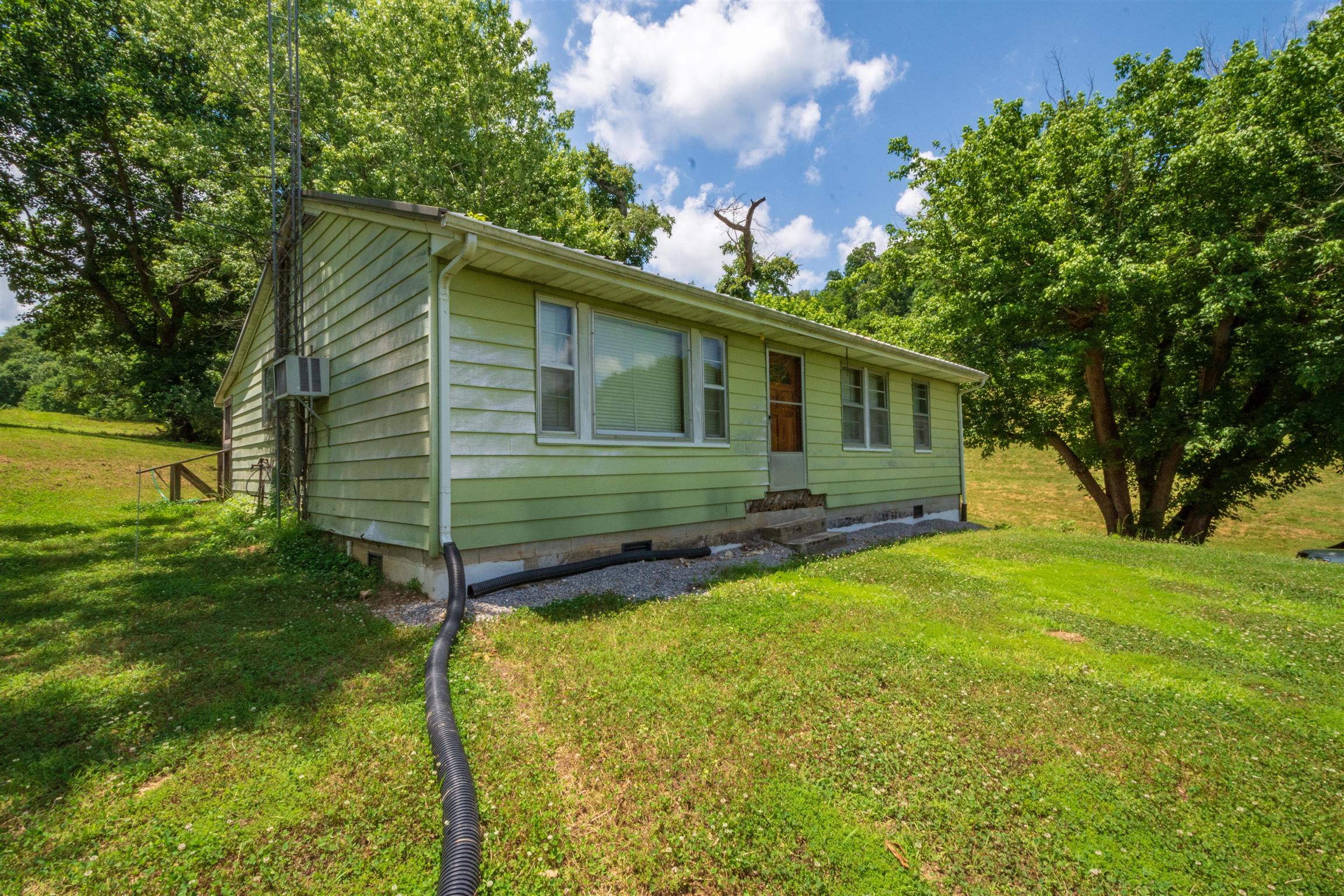 198 Ben Johnson Road Pulaski, TN 38478 - Photo 24 of 30 a view of a house with a backyard