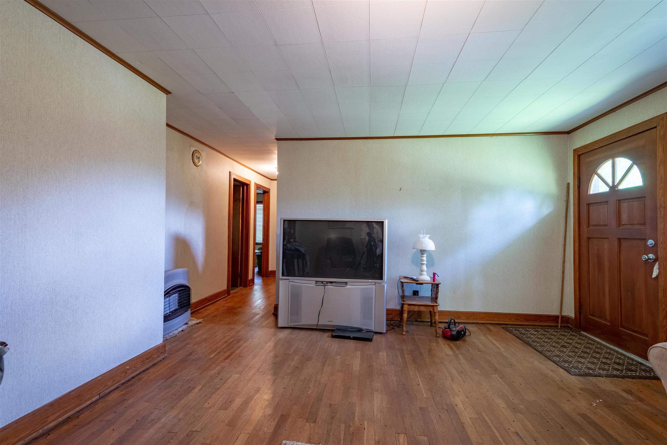 198 Ben Johnson Road Pulaski, TN 38478 - Photo 28 of 30 a view of a livingroom with wooden floor and a flat screen tv