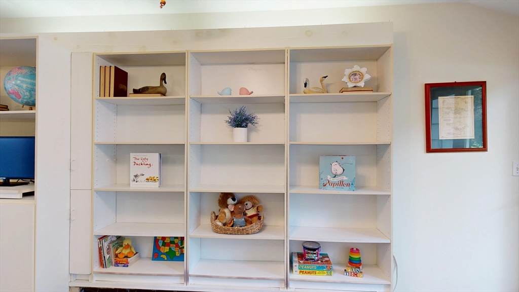 40 Anthony Road North Reading, MA 01864 - Photo 9 of 31 a cabinet with a painting on the wall