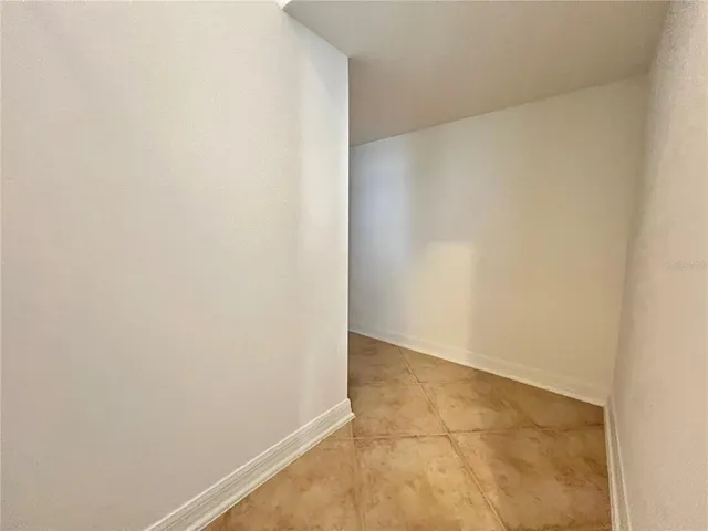 a bathroom with a sink toilet and a mirror
