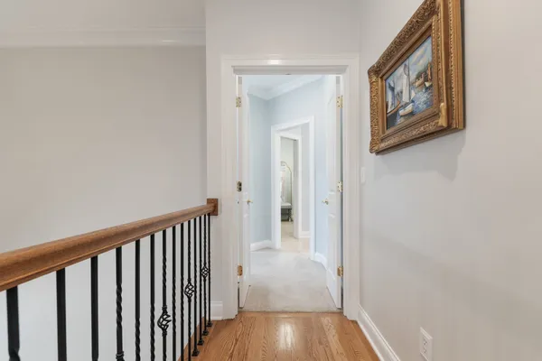 a bed room with a bed and a large window