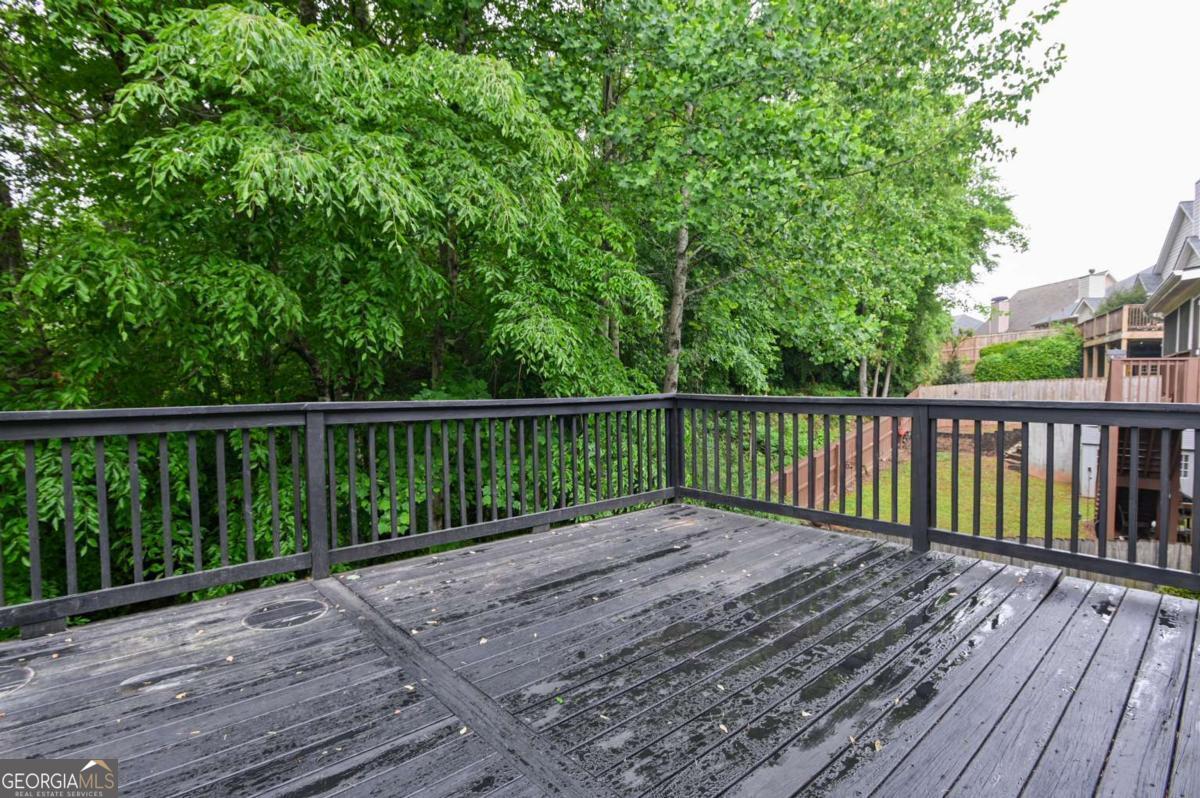 170 Meredith Ridge Road, Unit 8 Athens, GA 30605 - Photo 40 of 52 a view of balcony with wooden floor