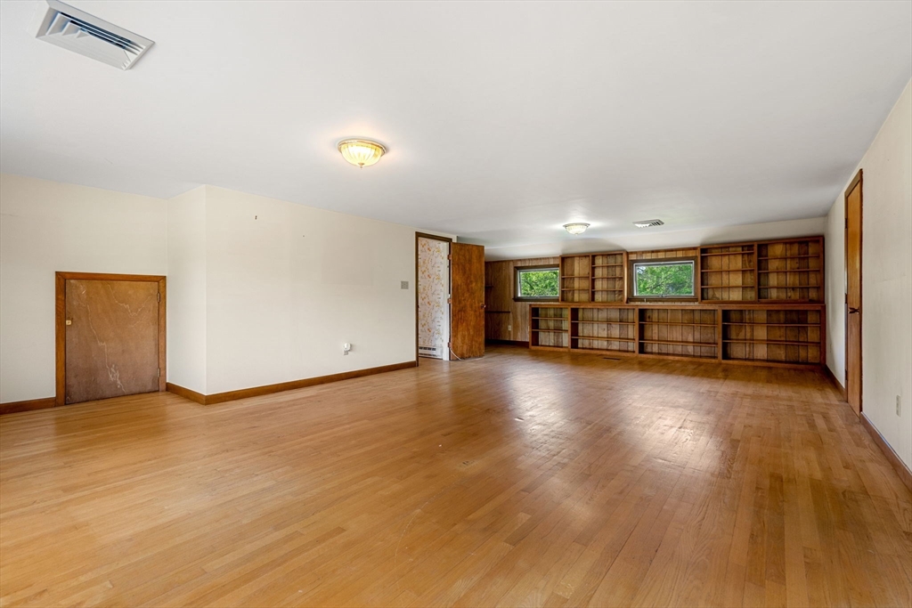 30 Bailey Road Andover, MA 01810 - Photo 26 of 37 a view of a livingroom with wooden floor and furniture