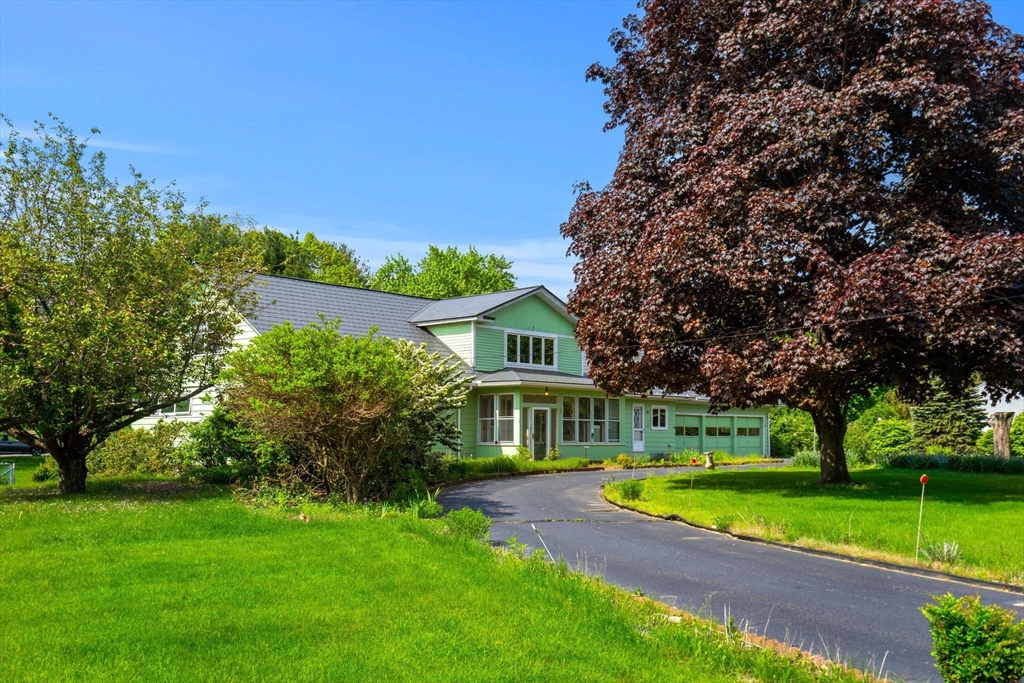 30 Bailey Road Andover, MA 01810 - Photo 28 of 37 a view of house with a big yard plants and large trees